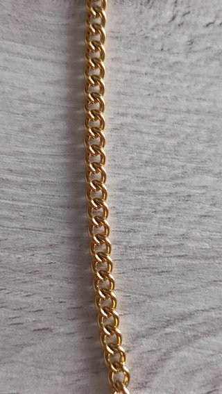 Cadena dorada para gafas