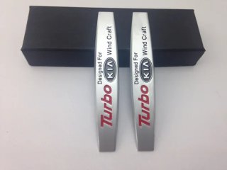 EMBLEMA LATERAL TURBO KIA MATE