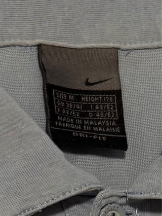 Polo Nike Court Vintage Azul con Detalles Bordados