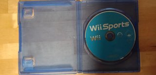 Wii negra, 2 mandos,2 Nuchuck y  juego Wii Sports