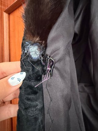 Abrigo KESII de piel natural negra tipo astracán