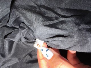 Abrigo KESII de piel natural negra tipo astracán