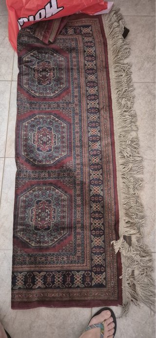 Alfombra persa multicolor con flecos