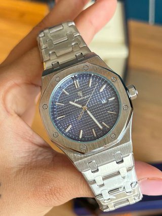 Reloj Poedagar nuevo.