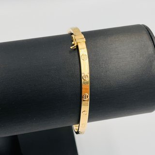 Pulsera caña cartier 18k