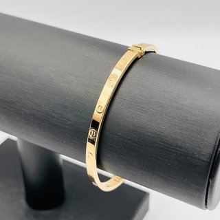 Pulsera caña cartier 18k