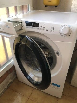 Lavadora Candy HCU2102DWB4/1-S Blanca