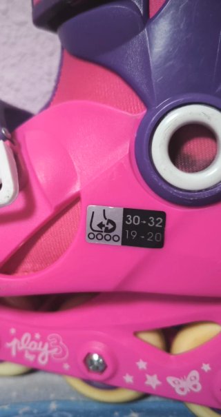 Patines rosas y morados con protecciones