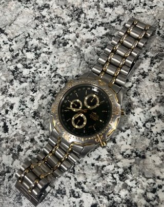 Reloj Lotus Elegante Oro y Plata