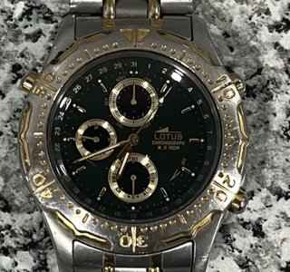 Reloj Lotus Elegante Oro y Plata