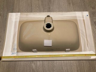 Pica de baño de porcelana beige