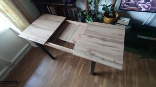 Mesa de comedor extensible de madera