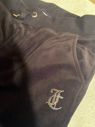 Pantaloni Juicy Couture neri con strass