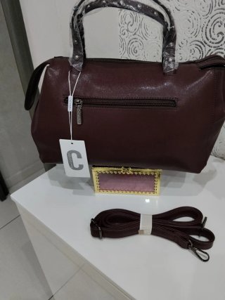 Borsa Coconuda bordeaux che va nel Marrone