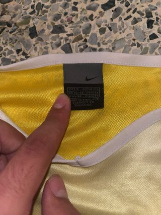 Camiseta Nike Deportiva Dorada