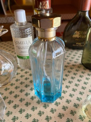 12 boccette profumo vuote.Alcune fuori produzione