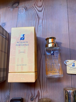 12 boccette profumo vuote.Alcune fuori produzione