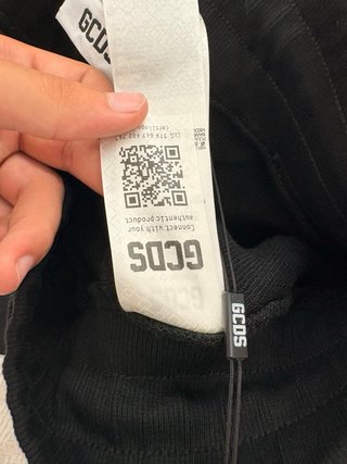 Pantaloni GCDS neri con banda rossa