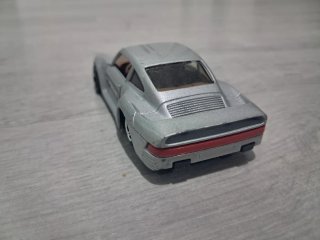 Coche de juguete Porsche plateado escala 1:43