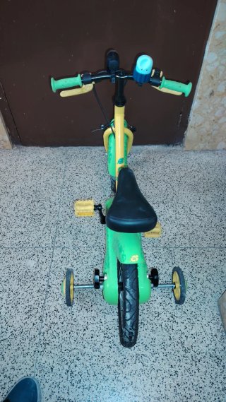 Bicicleta infantil B'Twin verde y amarilla