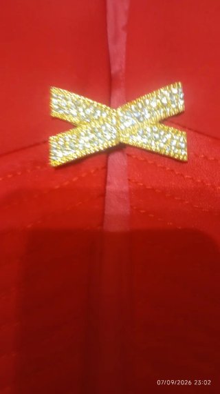 Giacca rossa con chiusura gioiello Made in Italy