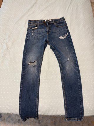 Vaqueros desgastados azules
