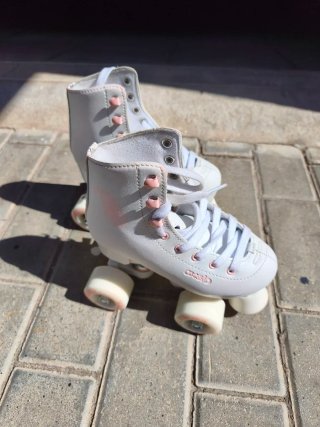 Patines 4 ruedas Oxelo talla 30. Puesto 5 min
