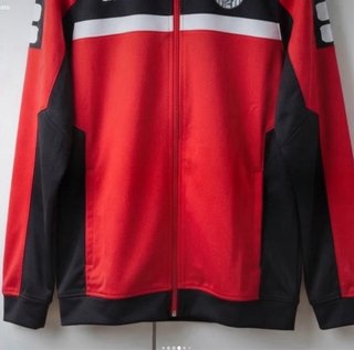 Chaqueta deportiva Erima roja y negra