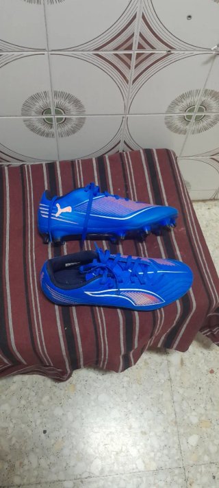 Zapatillas de fútbol Puma niño azul y rosa