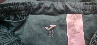 Pantalón corto running Joma verde azulado
