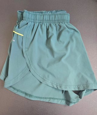 Pantalón corto running Joma verde azulado