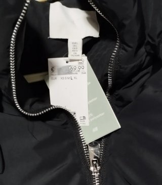 Chaqueta acolchada larga mujer negra