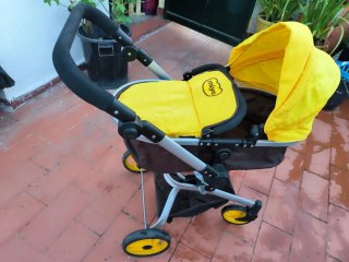 Carrito de muñecas Miyo amarillo