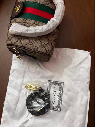 Borsa marrone con strisce verdi