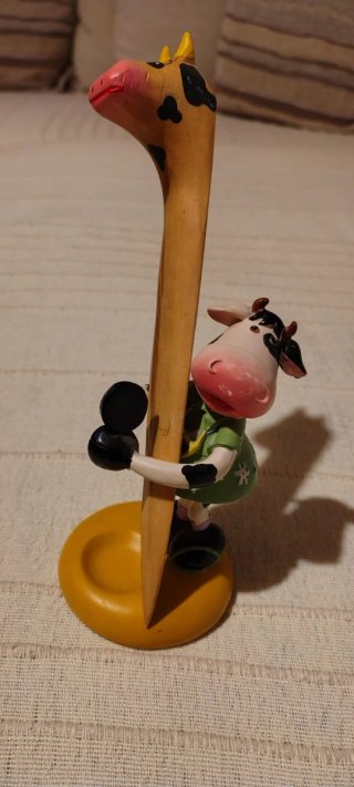 Figura mucca con tagliacarte