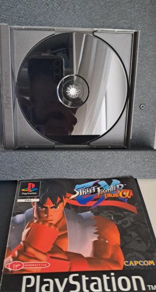 Street Fighter Alpha Plus copertina strappata..