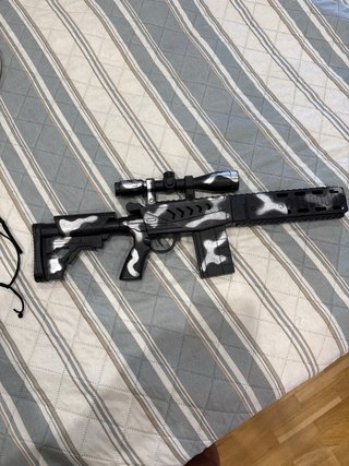 Conjunto de juguetes de armas y arco.