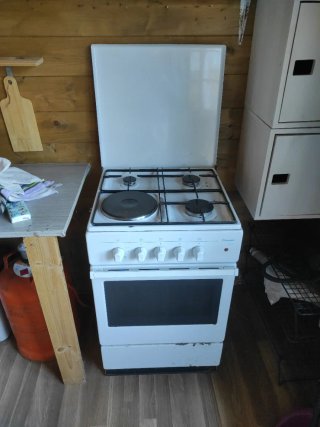 Cocina gas horno eléctrico blanca