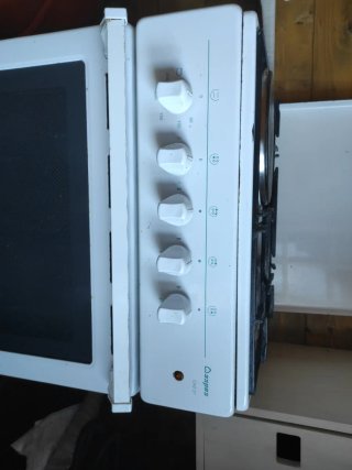 Cocina gas horno eléctrico blanca