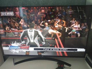 Consola PS3 con mando y juego