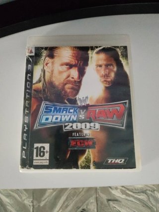 Consola PS3 con mando y juego
