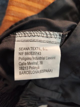 Pantalón gris con banda reflectante