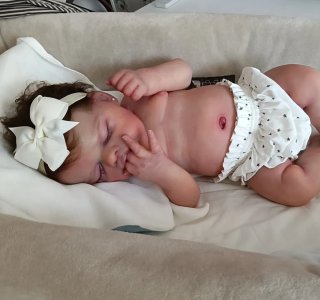 Muñeca silicona pelo injertado y armaduras