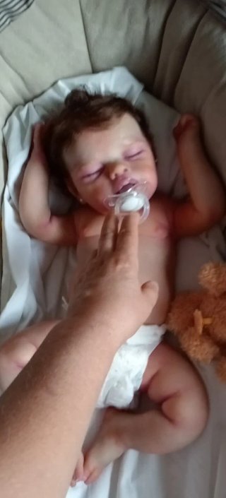 Muñeca silicona pelo injertado y armaduras