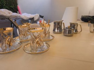Juego de té con cucharas y platillos