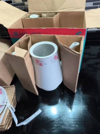 Juego de  café porcelana floral.
