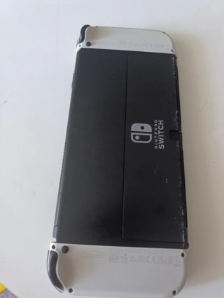 Nintendo Switch OLED Bianca + Zelda + FC24 + Custodia