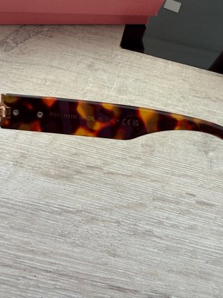 Occhiali da sole Miu Miu Tortoise