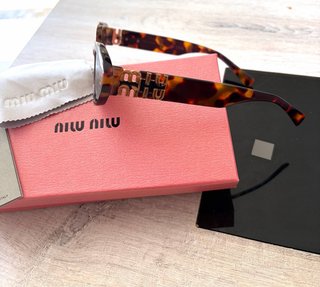 Occhiali da sole Miu Miu Tortoise