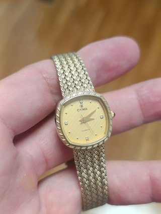 Reloj Cyma de oro con diamantes